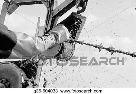 Lobster fisherman uses power wench to haul in lobster traps on rope View Large Photo Image Stock Image - Lobster fisherman uses power wench to haul in lobster traps on rope. Fotosearch