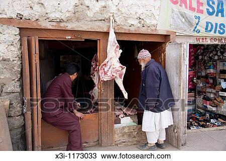 Stock Image - Local butcher in Leh, India. Fotosearch