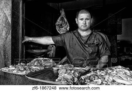 Stock Photo - Local butcher window selling meat and pork in local capital in Havana Cuba. Fotosearch