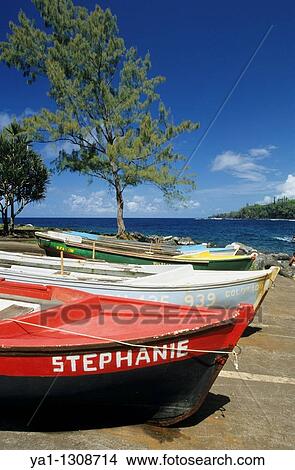 Local fishing boats, port of Anse des cascades (between Piton Sainte Rose and Bois Blanc), La Reunion island (France), Indian Ocean View Large Photo Image Picture - Local fishing boats, port of Anse des cascades (between Piton Sainte Rose and Bois Blanc), La Reunion island (France), Indian Ocean. Fotosearch