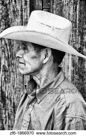 Stock Image - Local Honduran man with cowboy hat in Copan Ruinas Honduras. Fotosearch