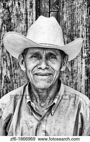 Stock Photo - Local Honduran man with cowboy hat in Copan Ruinas Honduras. Fotosearch