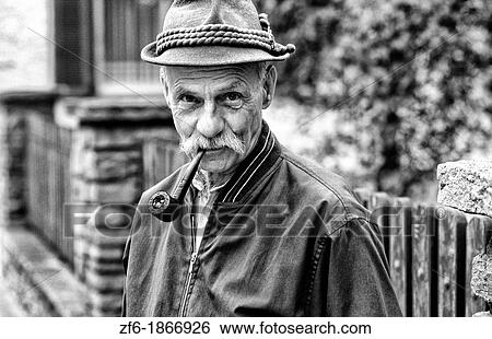 Local man with pipe in St Moritz, Switzerland View Large Photo Image Stock Photograph - Local man with pipe in St Moritz, Switzerland. Fotosearch