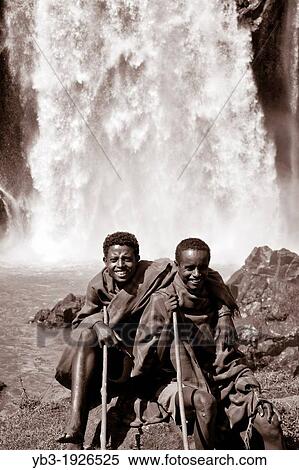 Stock Photography - Local People, Blue Nile Falls, Bahir Dar, Ethiopia. Fotosearch