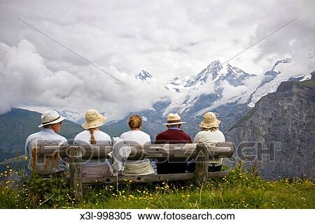 Local people comtemplating Monch mountain Alps Switzerland View Large Photo Image Stock Photography - Local people comtemplating Monch mountain Alps Switzerland. Fotosearch