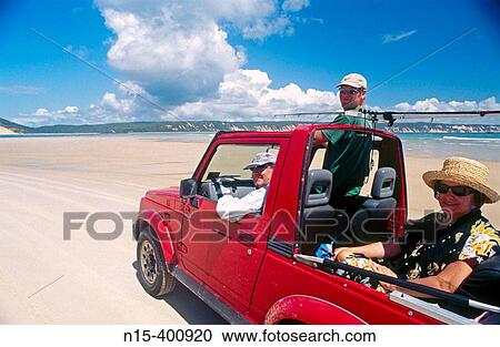 Local people in their 4WD car, driving on the beach at Rainbow Bay, Cooloola National Park, Sunshine Coast, Queensland, Australia View Large Photo Image Stock Image - Local people in their 4WD car, driving on the beach at Rainbow Bay, Cooloola National Park, Sunshine Coast, Queensland, Australia. Fotosearch