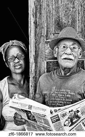Local portrait of people in doorway in Santa Clara Cuba View Large Photo Image Stock Photo - Local portrait of people in doorway in Santa Clara Cuba. Fotosearch