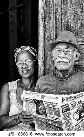 Local portrait of people in doorway in Santa Clara Cuba View Large Photo Image Stock Photograph - Local portrait of people in doorway in Santa Clara Cuba. Fotosearch