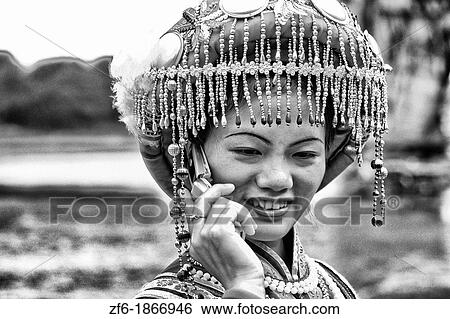 Local woman in traditional costume having communication with cell phone portrait in Guilin area of China View Large Photo Image Stock Photograph - Local woman in traditional costume having communication with cell phone portrait in Guilin area of China. Fotosearch