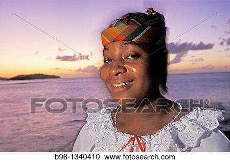 Local woman part of folk dance company at sunset Saint Lucia, West Indies, View Large Photo Image Stock Image - Local woman part of folk dance company at sunset Saint Lucia, West Indies,. Fotosearch