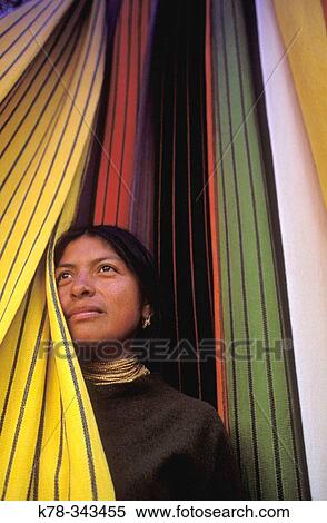 Local woman selling colorful fabrics at the famous Otavalo market. Otavalo, Ecuador View Large Photo Image Stock Photography - Local woman selling colorful fabrics at the famous Otavalo market. Otavalo, Ecuador. Fotosearch