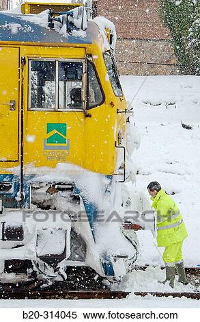 Locomotive at train station in winter. ZumBrraga. Guipzcoa, Spain View Large Photo Image Stock Photography - Locomotive at train station in winter. ZumBrraga. Guipzcoa, Spain. Fotosearch
