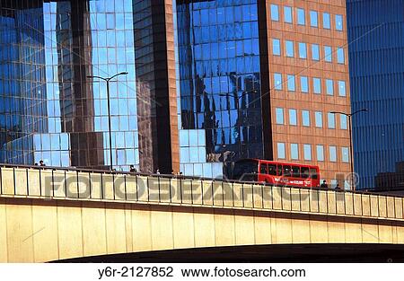 London Bridge, across the River Thames to the Southwark district on the south bank, on a sunny Summers day in the heart of London, England. View Large Photo Image Stock Image - London Bridge, across the River Thames to the Southwark district on the south bank, on a sunny Summers day in the heart of London, England.. Fotosearch
