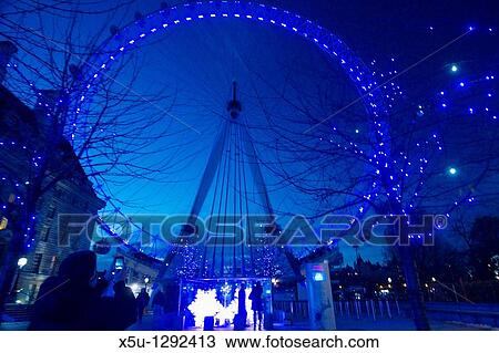 London Eye on the South bank of the Thames being photographed by tourist with smartphone View Large Photo Image Stock Image - London Eye on the South bank of the Thames being photographed by tourist with smartphone. Fotosearch
