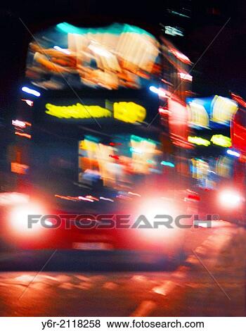 London red bus blur on Westminster Bridge in the heart of London, England, at night. View Large Photo Image Stock Photo - London red bus blur on Westminster Bridge in the heart of London, England, at night.. Fotosearch
