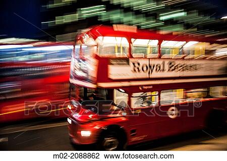 London's iconic bus at night, London, UK. View Large Photo Image Stock Image - London's iconic bus at night, London, UK.. Fotosearch