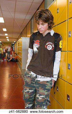 Lonely student in the hallway. View Large Photo Image Stock Image - Lonely student in the hallway.. Fotosearch