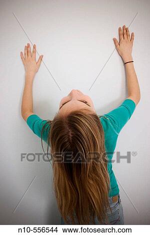 Long blond-hair teen girl posing. View Large Photo Image Picture - Long blond-hair teen girl posing.. Fotosearch