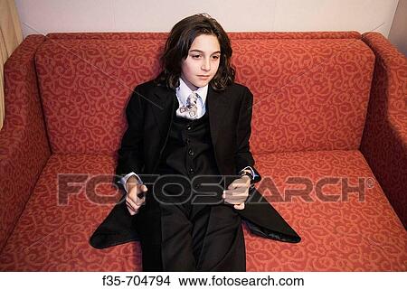 Long haired boy in suit and tie View Large Photo Image Picture - Long haired boy in suit and tie. Fotosearch