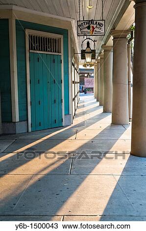 Long shadowed colonade along the French Market in the French Quarter of New Orleans View Large Photo Image Stock Image - Long shadowed colonade along the French Market in the French Quarter of New Orleans. Fotosearch