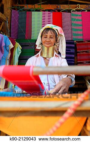 Longneck Karen woman sitting on the floor and weaving a scarf, Mae Hong Son, Thailand, Southeast Asia. View Large Photo Image Stock Image - Longneck Karen woman sitting on the floor and weaving a scarf, Mae Hong Son, Thailand, Southeast Asia.. Fotosearch