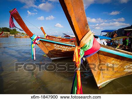Longtail boat on Ton Sai village Phi Phi Don island Krabi province, Andaman Sea, Thailand View Large Photo Image Stock Image - Longtail boat on Ton Sai village Phi Phi Don island Krabi province, Andaman Sea, Thailand. Fotosearch