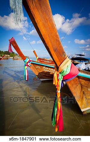 Stock Image - Longtail boat on Ton Sai village Phi Phi Don island Krabi province, Andaman Sea, Thailand. Fotosearch