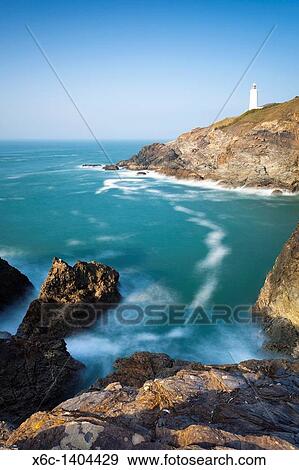 Looking across Stinking Cove from Dinas Head with Trevose Head in the background Cornwall England UK View Large Photo Image Stock Photo - Looking across Stinking Cove from Dinas Head with Trevose Head in the background Cornwall England UK. Fotosearch