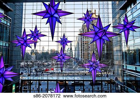Looking out at Columbus Circle and Central Park South, Manhattan, New York City. Seen from the Entry of the Shops at Time Warner Center, Christmas Holiday Decorative Lights Hanging from the Ceiling. View Large Photo Image Stock Image - Looking out at Columbus Circle and Central Park South, Manhattan, New York City. Seen from the Entry of the Shops at Time Warner Center, Christmas Holiday Decorative Lights Hanging from the Ceiling.. Fotosearch