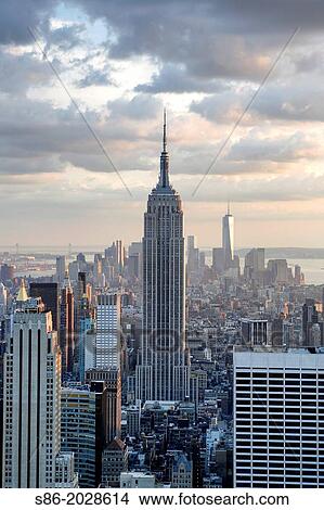 Looking South from Midtown Manhattan at the Empire State Building and Surrounding Area. View Large Photo Image Picture - Looking South from Midtown Manhattan at the Empire State Building and Surrounding Area.. Fotosearch