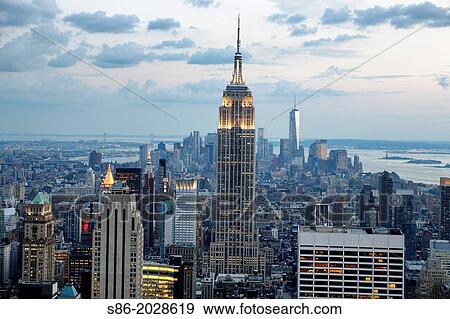 Looking South from Midtown Manhattan at the Empire State Building and Surrounding Area. View Large Photo Image Stock Photo - Looking South from Midtown Manhattan at the Empire State Building and Surrounding Area.. Fotosearch