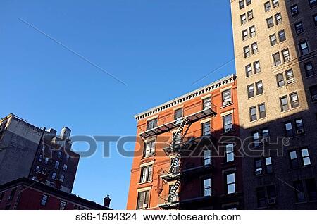 Looking up at an Upper West Side, New York City, Tenement Building View Large Photo Image Picture - Looking up at an Upper West Side, New York City, Tenement Building. Fotosearch