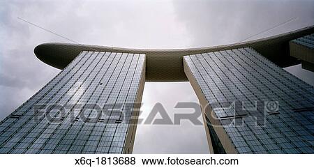 Stock Photo - Looking up at the Marina Bay Sands Hotel to the Skypark in Singapore. Fotosearch