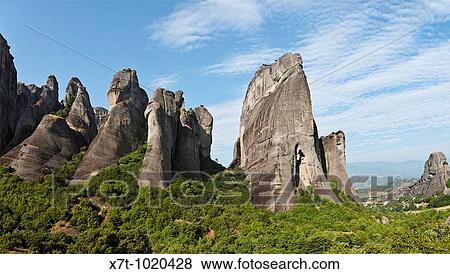 Stock Photo - looking up at the rock formations of the Meteora near Kalambaka, in Thessaly, central Greece. Fotosearch