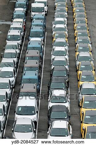 Lot of new cars in the port of Barcelona, Catalonia, Spain View Large Photo Image Stock Photo - Lot of new cars in the port of Barcelona, Catalonia, Spain. Fotosearch