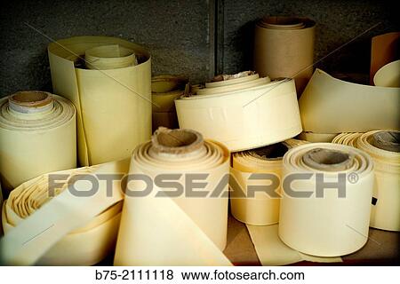 Lots of paper rolls in a workshop View Large Photo Image Stock Photo - Lots of paper rolls in a workshop. Fotosearch