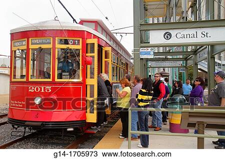 Stock Image - Louisiana, New Orleans, RTA, Regional Transit Authority, RTA, public transportation, Riverfront Streetcar Line, Canal Street stop, tram, trolley, open door, boarding, line, queue, man, woman, passenger, station,. Fotosearch