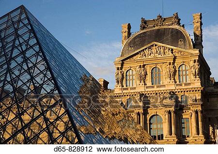 Stock Image - Louvre Museum and the Pyramid at sunset, Paris, France. Fotosearch