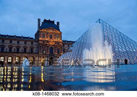 Stock Image - Louvre, museum, night, pyramid, architect Ieoh Ming Pei, Napoleon, Court, fountain, France, Par? s. Fotosearch