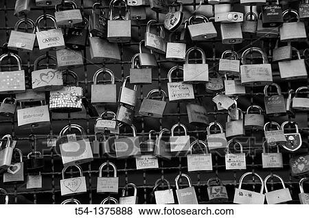 Stock Photo - Love locks at the Hohenzollern Bridge in Cologne. Fotosearch