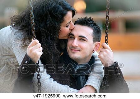 Lovers in the park View Large Photo Image Stock Image - Lovers in the park. Fotosearch