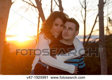 Lovers in the park View Large Photo Image Stock Image - Lovers in the park. Fotosearch