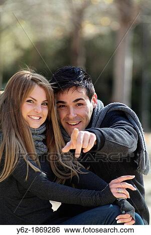 Loving couple having fun View Large Photo Image Stock Photograph - Loving couple having fun. Fotosearch