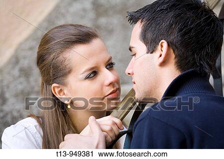 Lovingly look between young couple View Large Photo Image Stock Image - Lovingly look between young couple. Fotosearch