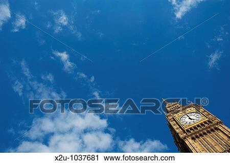 Low angle view of Big Ben and blue sky, London, England View Large Photo Image Stock Image - Low angle view of Big Ben and blue sky, London, England. Fotosearch