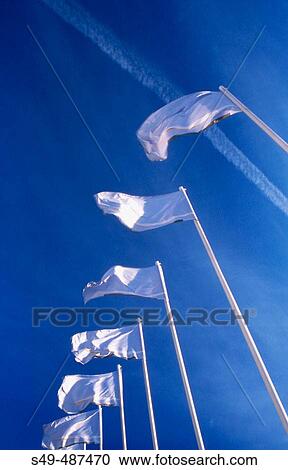 Stock Image - Low angle view of flags. Fotosearch