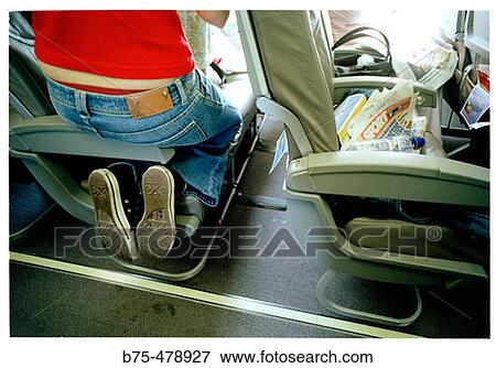 Stock Photo - Low cost airline airplane interior. Fotosearch