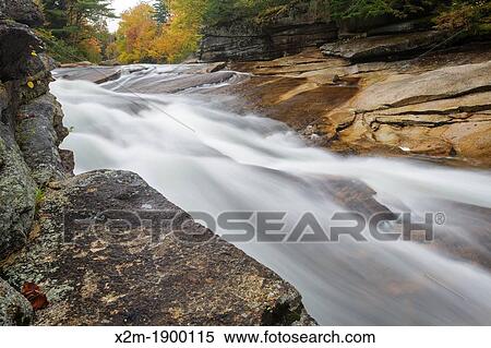 Lower Ammonoosuc Falls in Carroll, New Hampshire USA during autumn months These falls are located along the Ammonoosuc River View Large Photo Image Stock Photography - Lower Ammonoosuc Falls in Carroll, New Hampshire USA during autumn months These falls are located along the Ammonoosuc River. Fotosearch