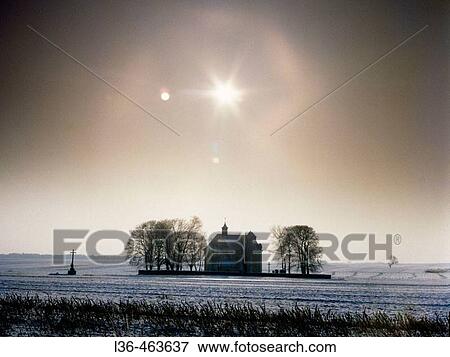 Lubelski region. Poland. Small church in the field View Large Photo Image Stock Photo - Lubelski region. Poland. Small church in the field. Fotosearch