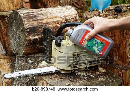 Lubricant and chainsaw, Guipuzcoa, Basque Country, Spain View Large Photo Image Stock Photo - Lubricant and chainsaw, Guipuzcoa, Basque Country, Spain. Fotosearch